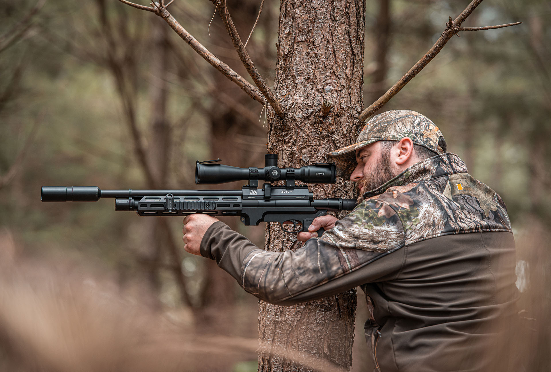 man holding an air rifle