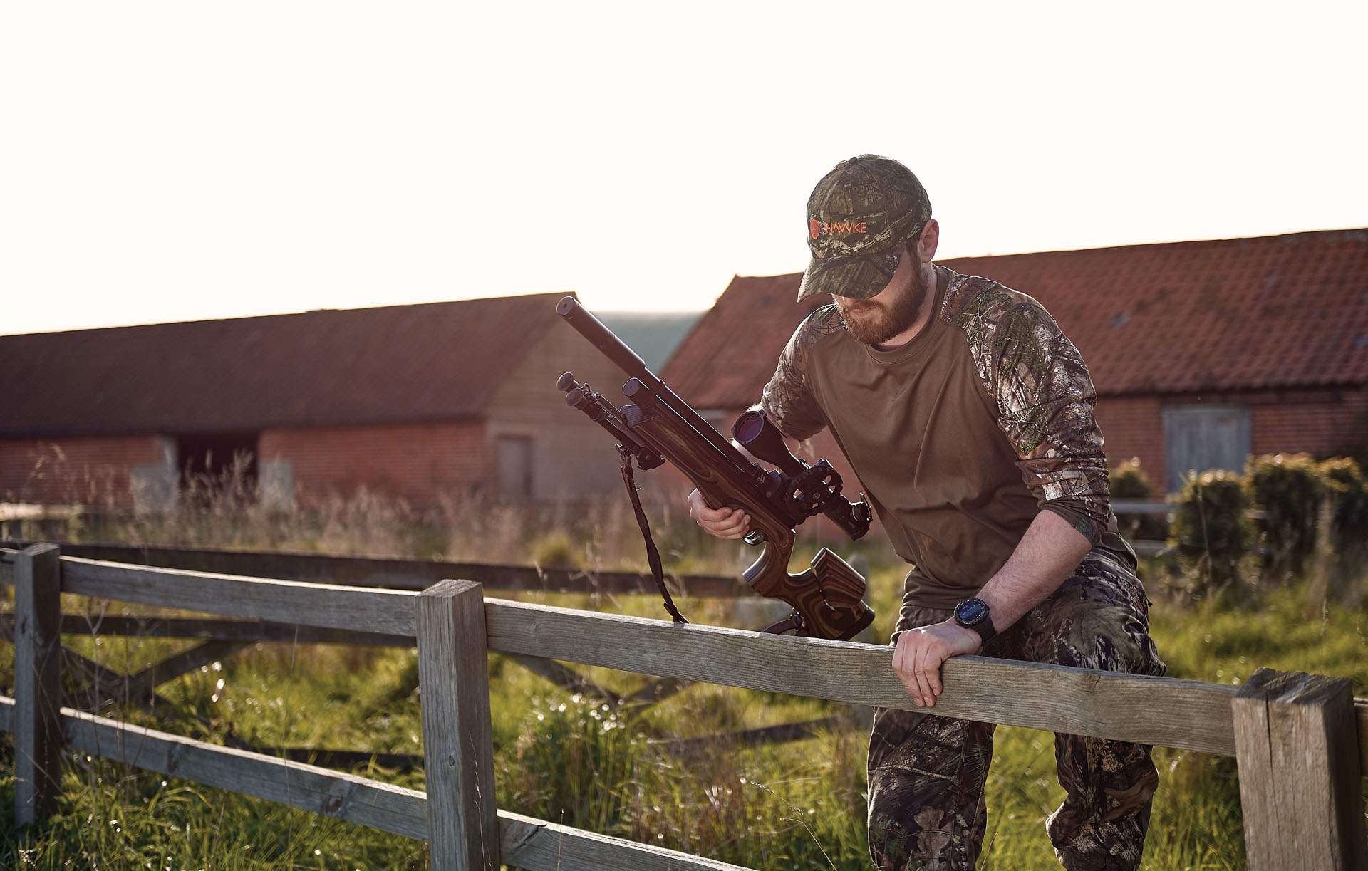 man carrying air rifle