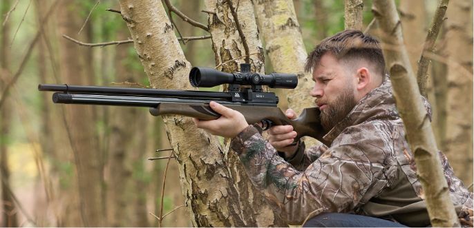 Man Shooting Air Arms rifle