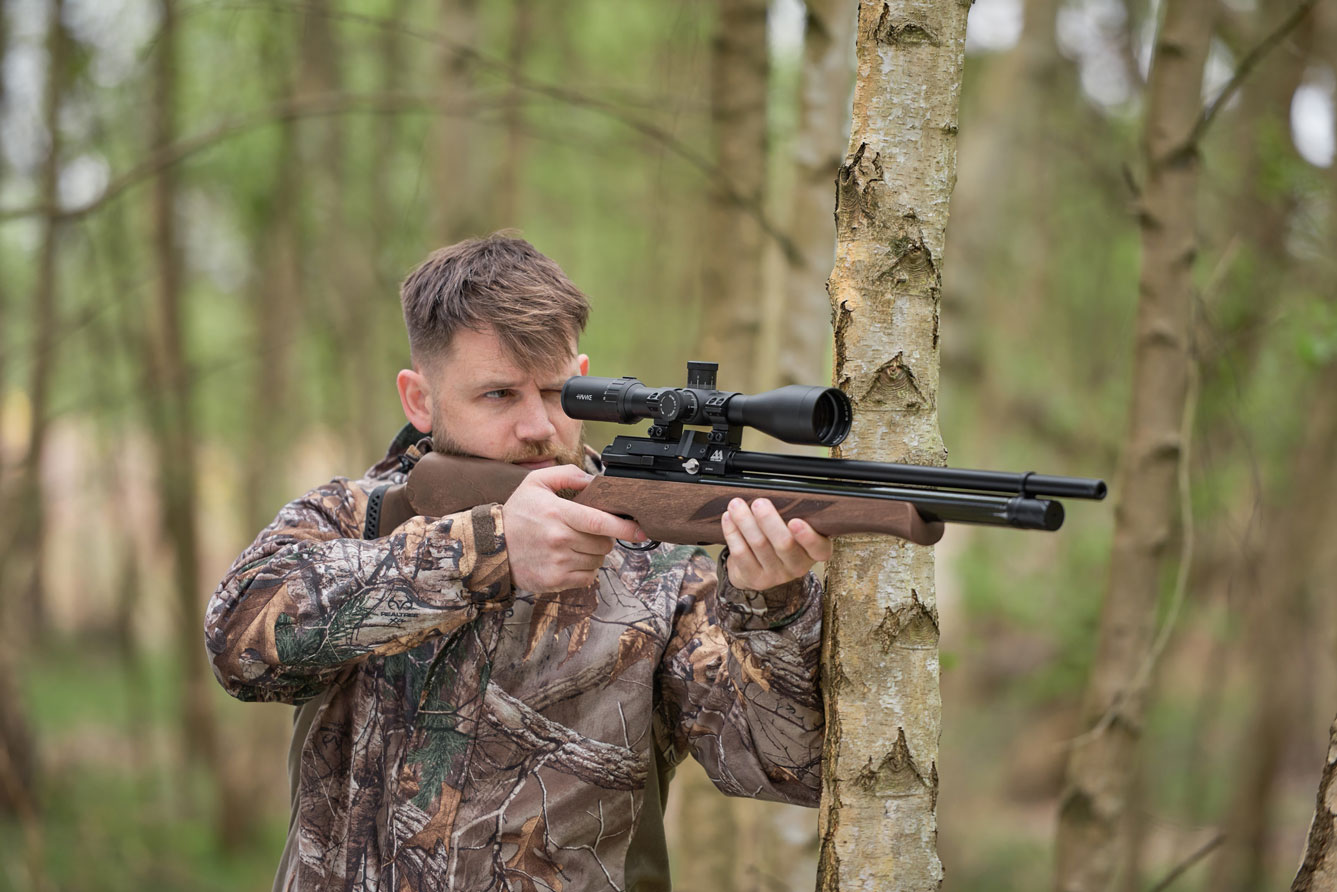 Man aiming Air Rifle