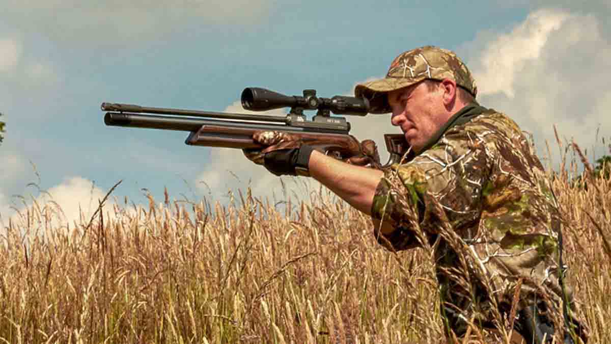 man shooting air rifle